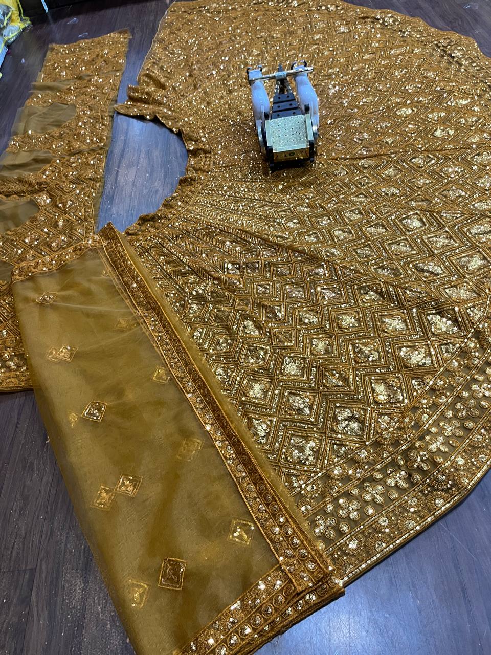 Brown Color Sequence Work Soft Net Lehenga Choli