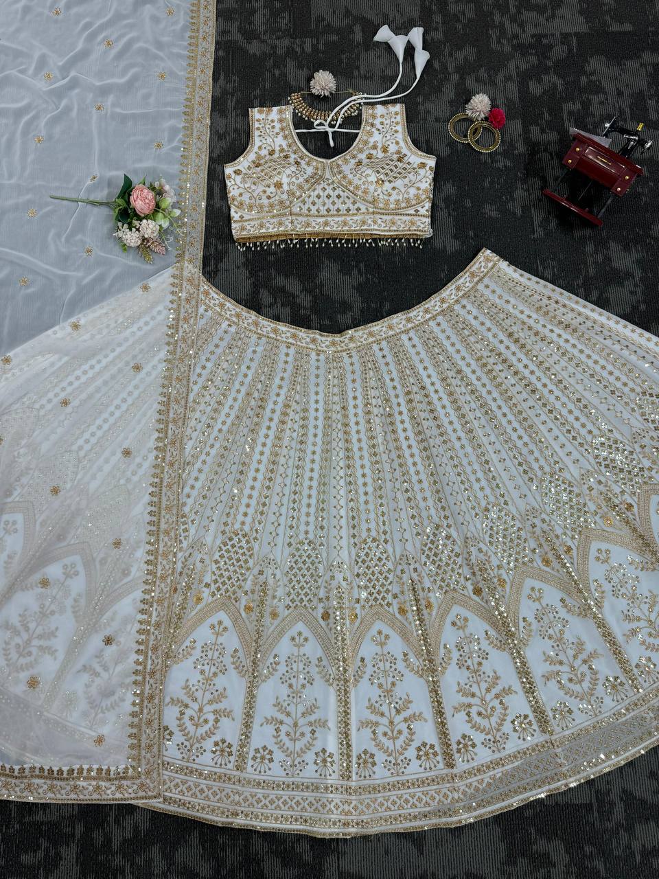 Wedding Wear White Colour Thread Sequence Work Lehenga Choli