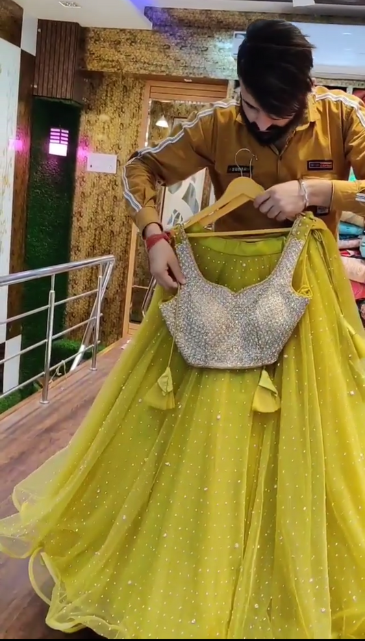 Smashing Lemon Yellow Soft Net Semi Stitched Party Wear Lehenga Choli For Women