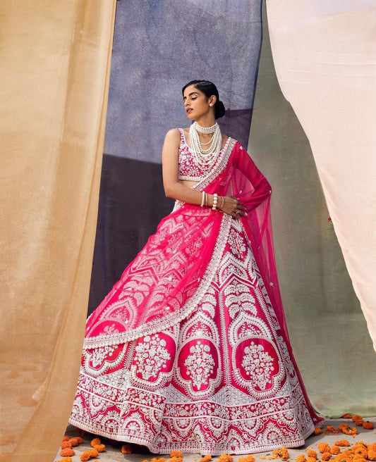 Latest Designer Bridal Wear Rani Pink Color Tapeta Heavy Coading Work Lehenga Choli.