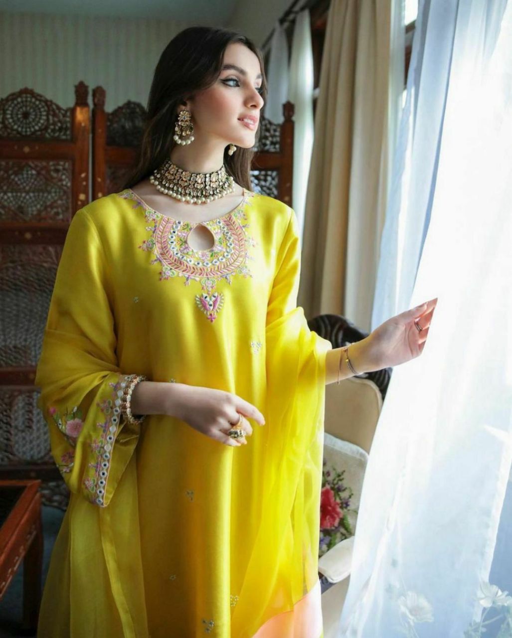 Lovely Straight Cut Lemon Yellow Georgette Semi Stitched Suit